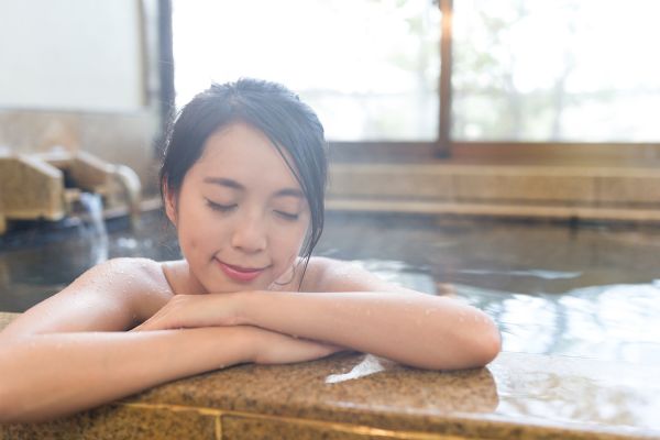 A woman in an onsen