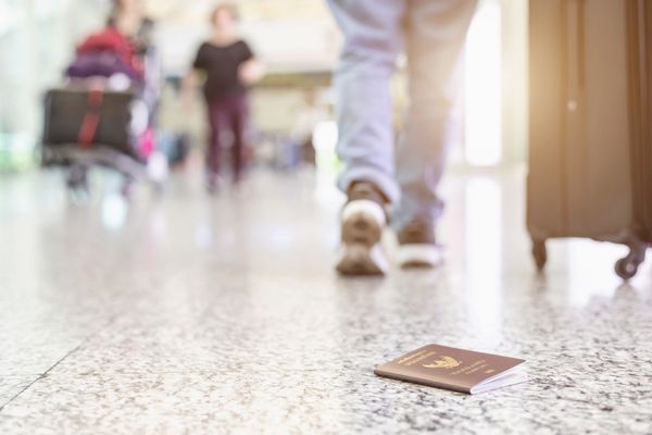 Passport that fell from a passenger's bag in an airport.